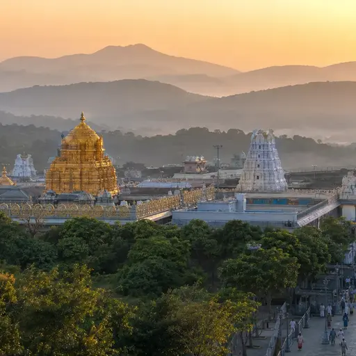 Tirupati Venkateswara temple gopuram on Tirumala Hill at dawn