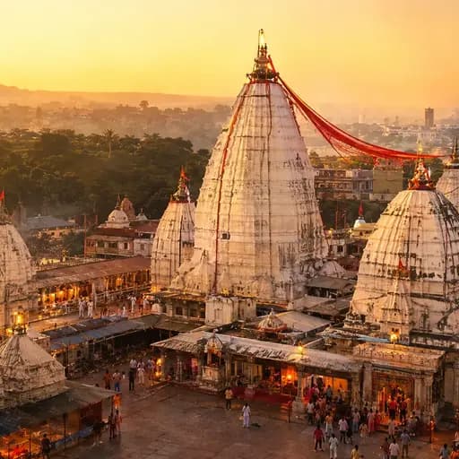 The stone shikhara of Baba Baidyanath Dham temple in Deoghar surrounded by the sacred complex of twenty-two shrines in morning sunlight